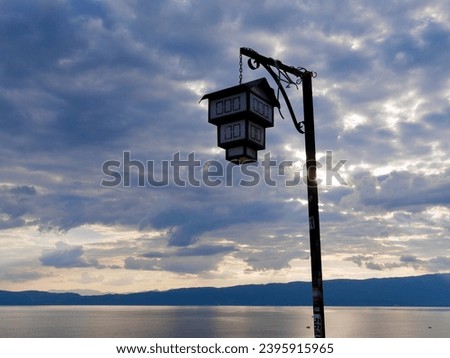 Traditional Ohrid house themed lantern at sunset. High quality photo