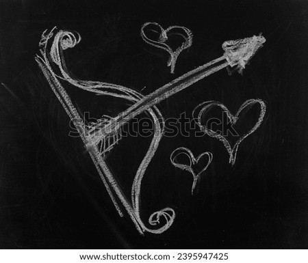 Icon cupid's arrow and bow, hand draw chalk on chalkboard, blackboard texture