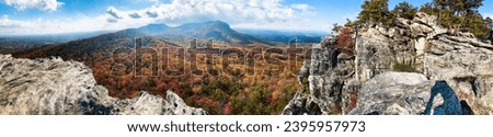 Hanging Rock State Park, North Carolina. cliffs, plateaus, with rock climbing, lake fishing, swimming, camping, hiking. Good views for colorful autumn foliage. gorgeous peak fall color. 360 view. Royalty-Free Stock Photo #2395957973