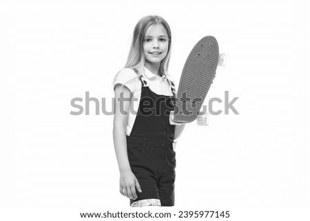 teen girl with skateboard on background. photo of teen girl with skateboard.