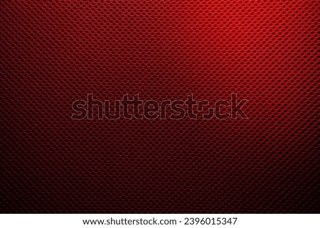A background or wallpaper with abstract red carbon fiber textures - copy space