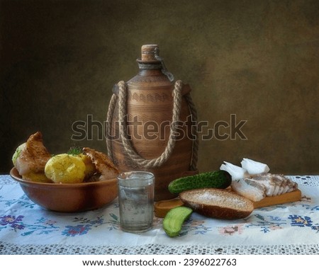 Kitchen still life with grilled pork and potatoes