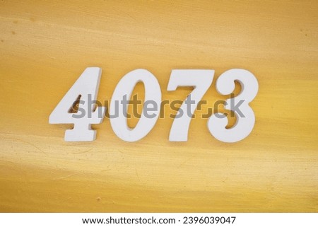 The golden yellow painted wood panel for the background, number 4073, is made from white painted wood.