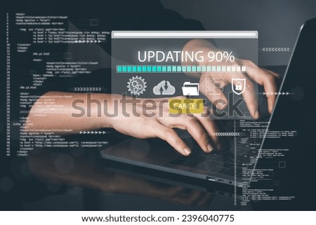 Operating system upgrade concept, installation app and software update process, modernize user equipment, update modern functions, developer released new version Improved security. User is downloading Royalty-Free Stock Photo #2396040775