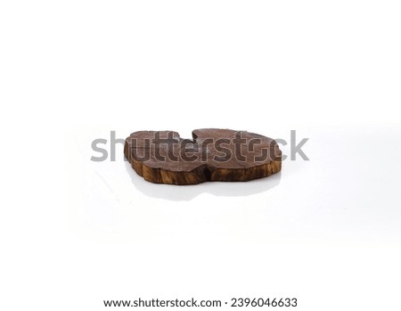 a wooden prop used to decorate or place things on top of it. An empty platform for display products, food and design Royalty-Free Stock Photo #2396046633