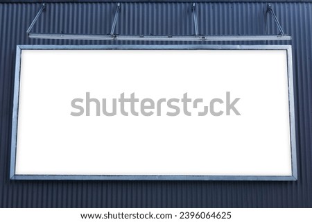 Blank billboard background. Advertisment on corrugated metal sheet. Empty copy space poster signpost panel. High street banner by the road. Building wall with blank commercial space.