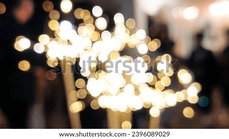 Golden Yellow decoration light at a wedding party shot in bokeh