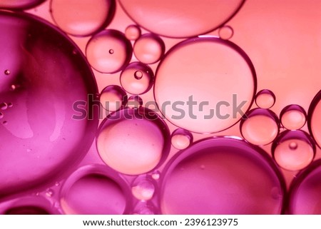 Purple drops of oil or serum texture background. Abstract purple fluid with bubbles. Macro shot	
 Royalty-Free Stock Photo #2396123975
