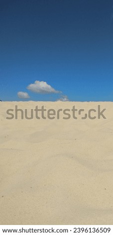 loose sand and blue sky