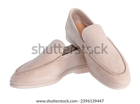 
Pair of classic beige loafers isolated on white background Royalty-Free Stock Photo #2396139447