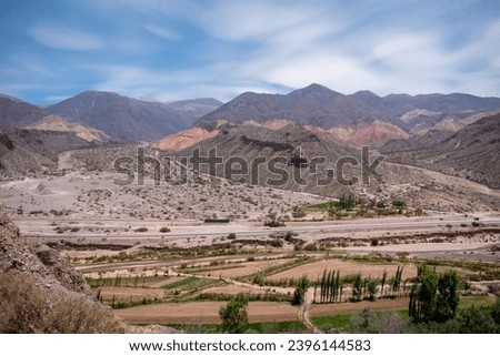 Famous Quebrada de Humahuaca in Jujuy, Argentina. Panoramic view of the Quebrada de Humahuaca, Jujuy, Argentina. Beautiful colorful mountains in northern Argentina Royalty-Free Stock Photo #2396144583