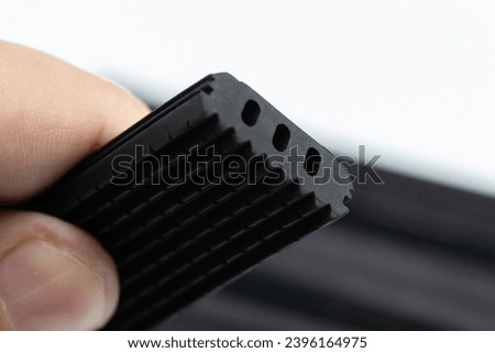 Close-up shot of various rubber profile products Royalty-Free Stock Photo #2396164975