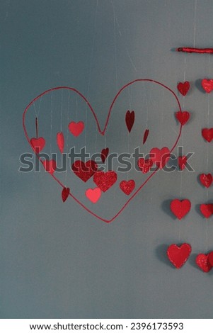 Crafts made from red hearts symbolizing love and happiness during the upcoming holidays