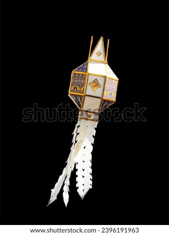 Lanna lanterns are the wisdom that combines the beliefs between Brahmanism and Buddhism that the Lanna people have. Created through art to be used as an offering to worship Buddha in the Yi Peng  Royalty-Free Stock Photo #2396191963