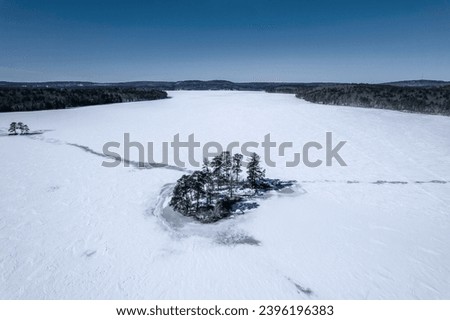 Aerial view of Lake Massabesic, New Hampshire in winter  