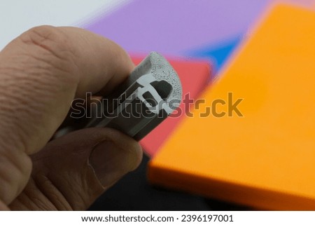 close-up cross section of co-extruded rubber profile Royalty-Free Stock Photo #2396197001
