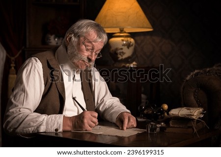 Reenactment image of a senior Victorian office worker or clerk  Royalty-Free Stock Photo #2396199315