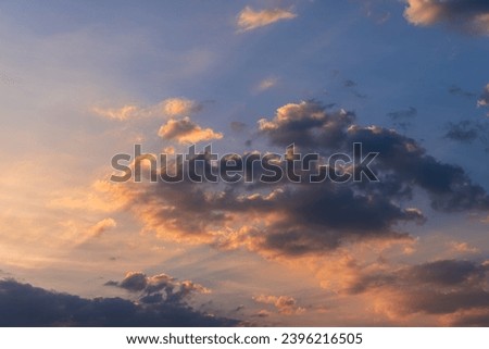 Background of colorful sky and sun rays, Dramatic sunset with twilight color sky and clouds.