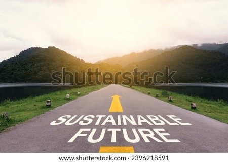 Sustainable future or straightforward concept. Text written on the highway road to the green forest. ESG concept, zero-emission, renewable energy, and Sustainable business. Royalty-Free Stock Photo #2396218591