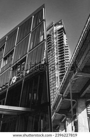 Urban skyline with skyscrapers. High-rise office buildings in Vancouver Canada. Black and white photo. Beautiful modern architecture of the building. Modern architecture photos with angular structure
