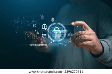 Concept of cyber security and online payment, Man holding credit card and using smartphone verification password for online financial transactions, Padlock icon for protection financial information,