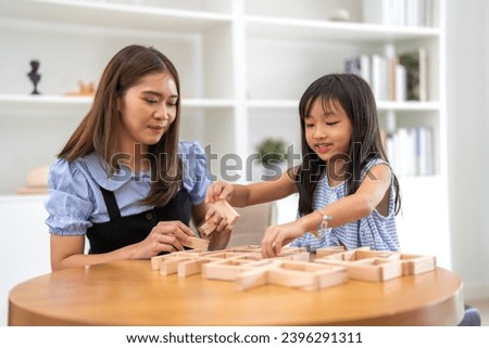 Portrait of enjoy happy love asian family mature mother and girl daughter smiling play and having fun together, mom, mother day, care, kid, child.happy family in moments good time at home