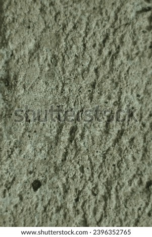 texture detail of a hollow and rough white stone surface, background texture
