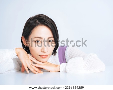 Beauty concept of middle aged Asian woman with natural makeup. Skin care. Cosmetics. Anti-aging.