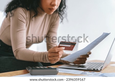 Stressed young woman has financial problems with credit card debt to pay crucial show concept of bad personal money and mortgage pay management crisis. Royalty-Free Stock Photo #2396359167