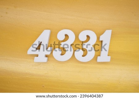 The golden yellow painted wood panel for the background, number 4331, is made from white painted wood.