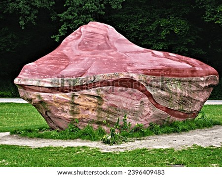 macro photo with a decorative natural background of a decorative element in the form of a natural stone as a symbol of love in the European park in Berlin for design as a source for prints, posters