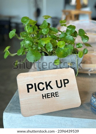 signage of pick up here at the cafe