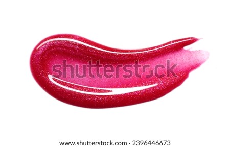 Red shimmering lipgloss texture isolated on white background. Smudged cosmetic product smear. Makup swatch product sample Royalty-Free Stock Photo #2396446673