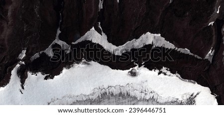  cast in black,  abstract photographs of the frozen regions of the earth from the air, abstract naturalism.
