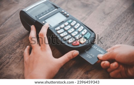 This captivating image collection delves into the realm of electronic payment systems, credit cards, and banking services. The visuals showcase the seamless integration of technology into financial tr Royalty-Free Stock Photo #2396459343