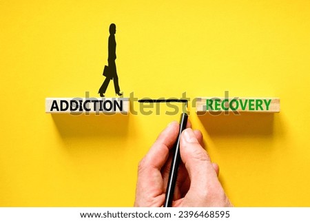 Addiction recovery symbol. Concept words Addiction recovery on beautiful wooden blocks. Psychologist icon. Beautiful yellow table yellow background. Psychology addiction recovery concept. Copy space. Royalty-Free Stock Photo #2396468595
