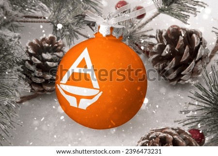 Christmas ball with the flag of Antarctica, decorates the snow tree with snowfall. The concept of the Christmas and New Year holiday