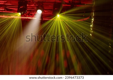clolorful spotlights with light rays