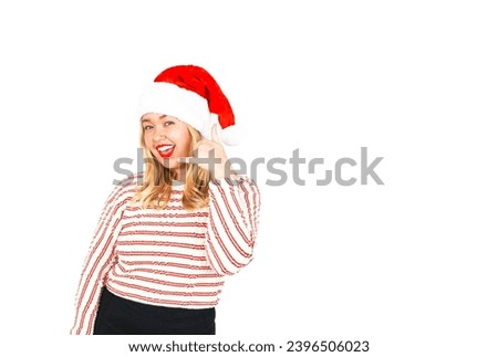 Pretty young blonde woman doing a call sign with her hand while wearing a Christmas hat against a white background