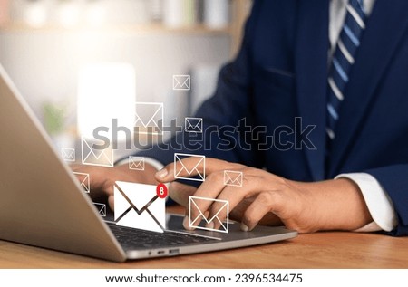 Business email communication in the digital age new messages and alerts. Inbox with email Marketing Strategy and Notifications. internet technology. businessman using smartphone with email.