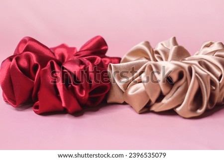 Jakarta, DKI Jakarta, Indonesia - Jan 12 2021: A scrunchie is a fabric-covered elastic hair tie that is used to fasten medium to long hair.