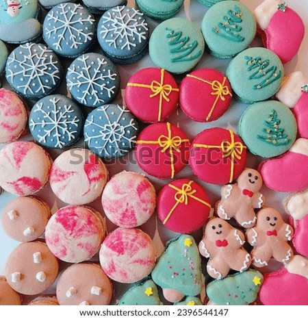 Macaron cakes of various colors and shapes to serve at Christmas parties 