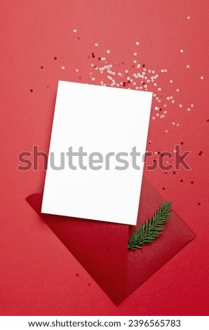 Christmas or New Year greeting card mockup on red background, copy space