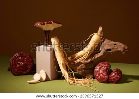 Minimal art background with fresh ginseng roots and ganoderma mushrooms decorated on brown background. Photo for medicine advertising, photography traditional medicine content