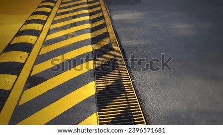 
Appearance of asphalt  and a slight zebra crossing from the side angle.