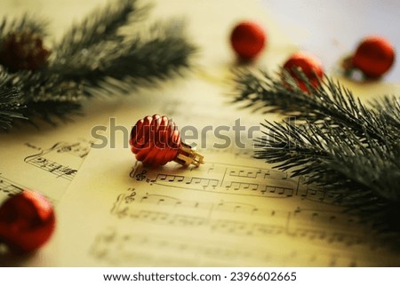 Christmas Sheet Music. Christmas decorations on music sheets