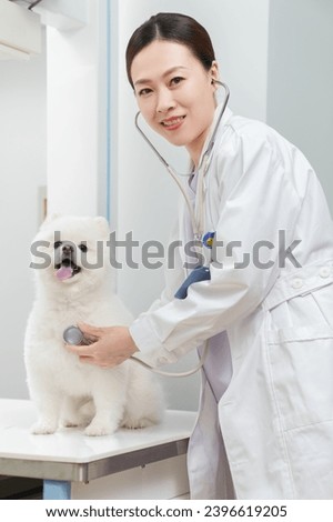 The pet doctor examined the puppy