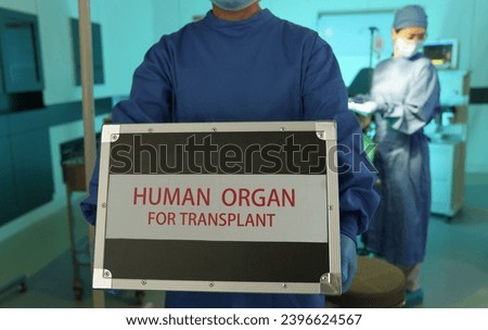 Operating room nurses holding the human organs for transplant
