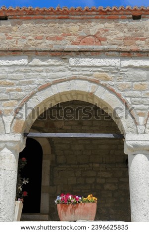One arch of the open porch at the St.Mary Church entrance -Kisha e Shen Merise- in the 1282 built Nativity of the Theotokos Monastery -Manastiri Lindja e Hyjlindeses Mari- precinct. Ardenica-Albania.