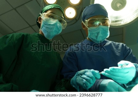 Medical workers operate in the operating room